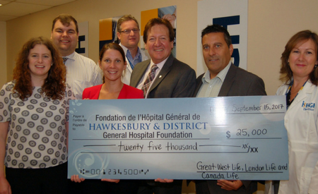 Representatives from Freedom 55 Life present 25,000$ cheque to HGH Foundation